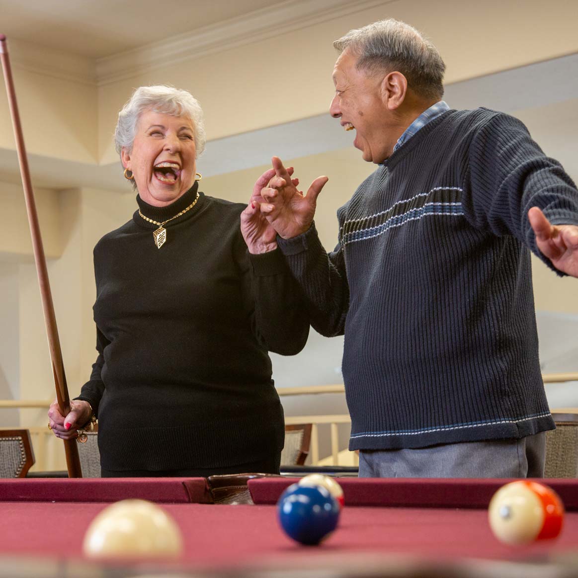 Residents playing billiards at Mulligan Park